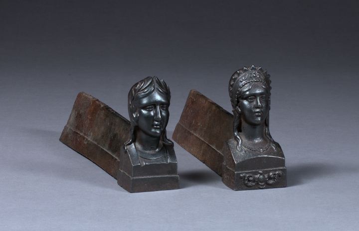 Appraisal: Rare Pair of French Cast-Iron Low Portrait Chenets first quarter