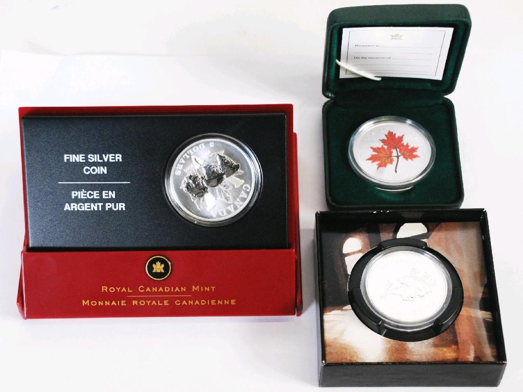 Appraisal: ROYAL CANADIAN MINT SILVER AND ENAMEL FIVE DOLLAR COIN in