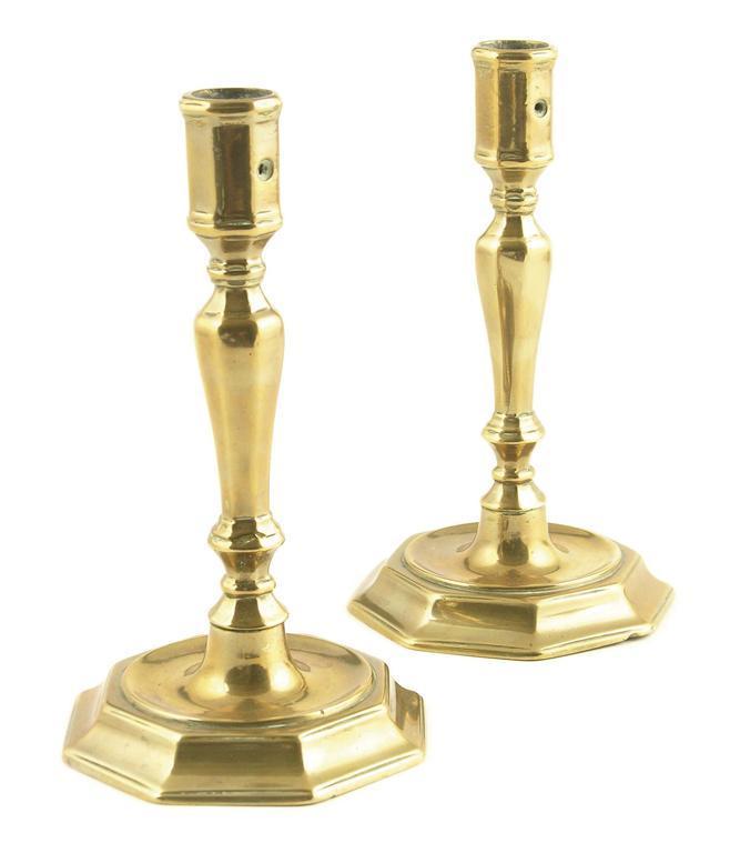 Appraisal: A pair of of early th century octagonal brass candlesticks