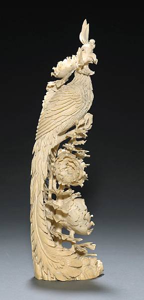 Appraisal: An ivory carving of phoenix and peony flowers th Century