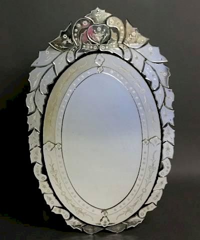 Appraisal: Oval Venetian reverse etched beveled mirror An oval Venetian mirror