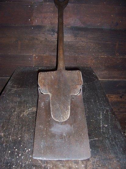 Appraisal: A fruitwood shovel with metal tip cm long