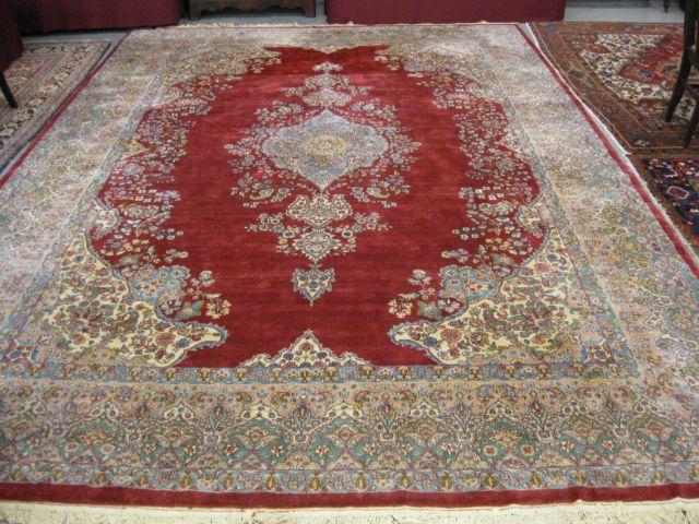 Appraisal: Kirman Persian Handmade Room Size Rug fine central medallion red