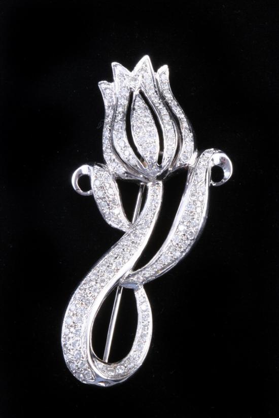 Appraisal: K WHITE GOLD AND DIAMOND TULIP DESIGN PIN Tulip has