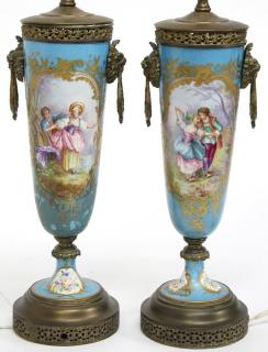 Appraisal: Pair of Sevres Porcelain Urn Lamps French with cartouches of