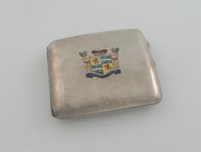 Appraisal: A modern cigarette case with an enamelled coat of arms