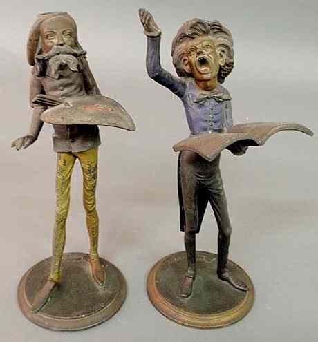 Appraisal: Two spelter metal whimsical figural candleholders signed F ois George