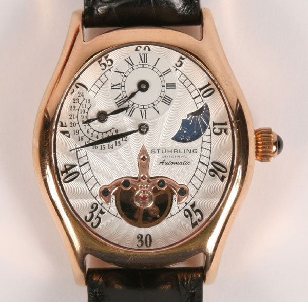 Appraisal: Men's automatic Stuhrling regulator watch with leather wristband with original