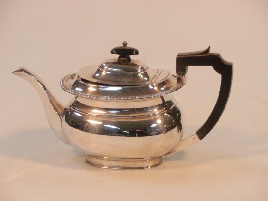 Appraisal: A George VI silver Bachelor's Tea Pot of round oblong