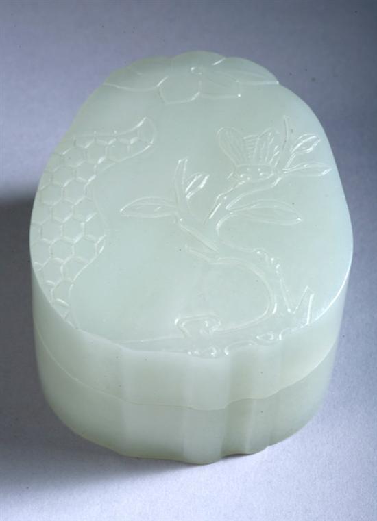 Appraisal: CHINESE CELADON JADE BOX AND COVER Carved to depict pomegranate