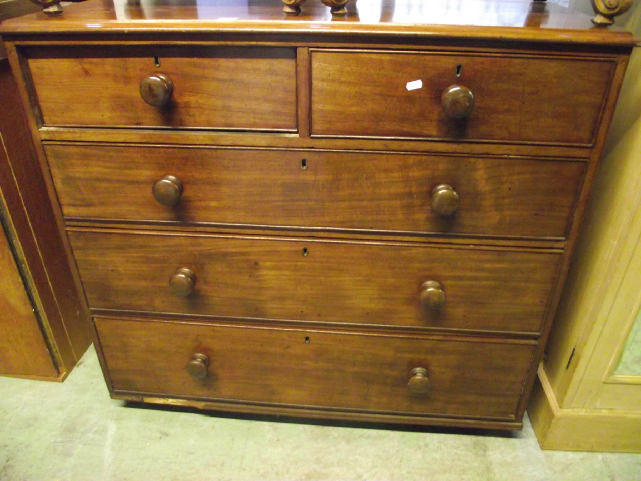 Appraisal: A th century mahogany bedroom chest of three long and