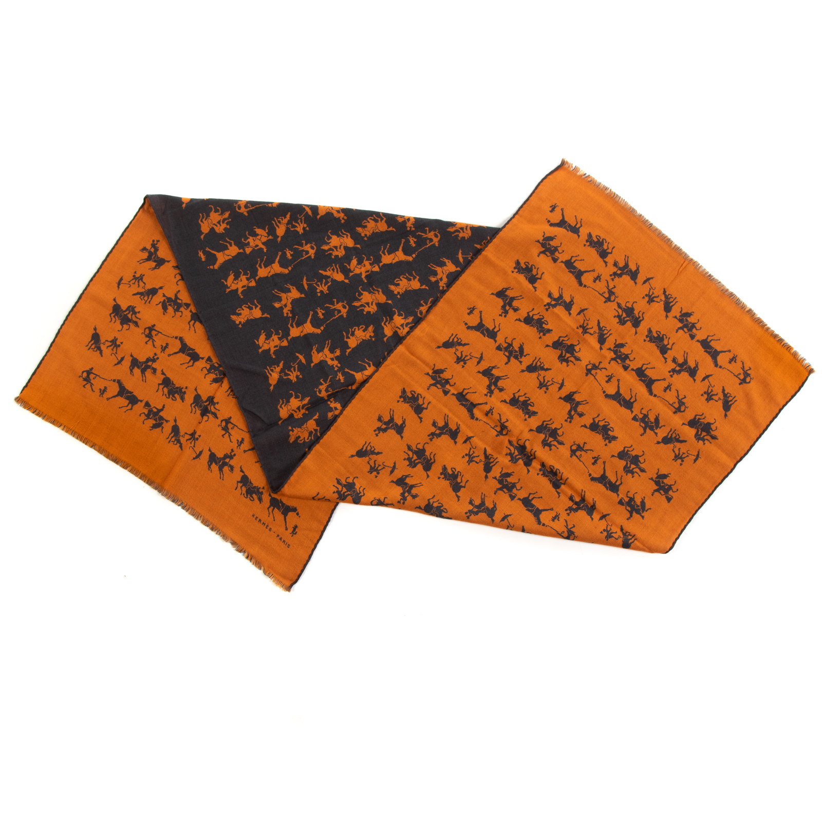 Appraisal: HERMES HORSE AND RIDER RECTANGLE STOLE An orange and brown