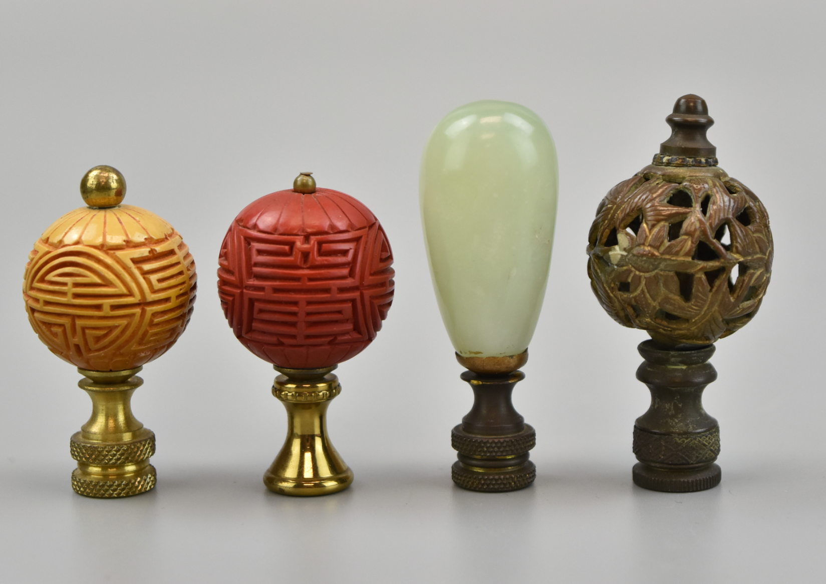 Appraisal: Chinese beautiful Chinese lamp finials a metal finial with a