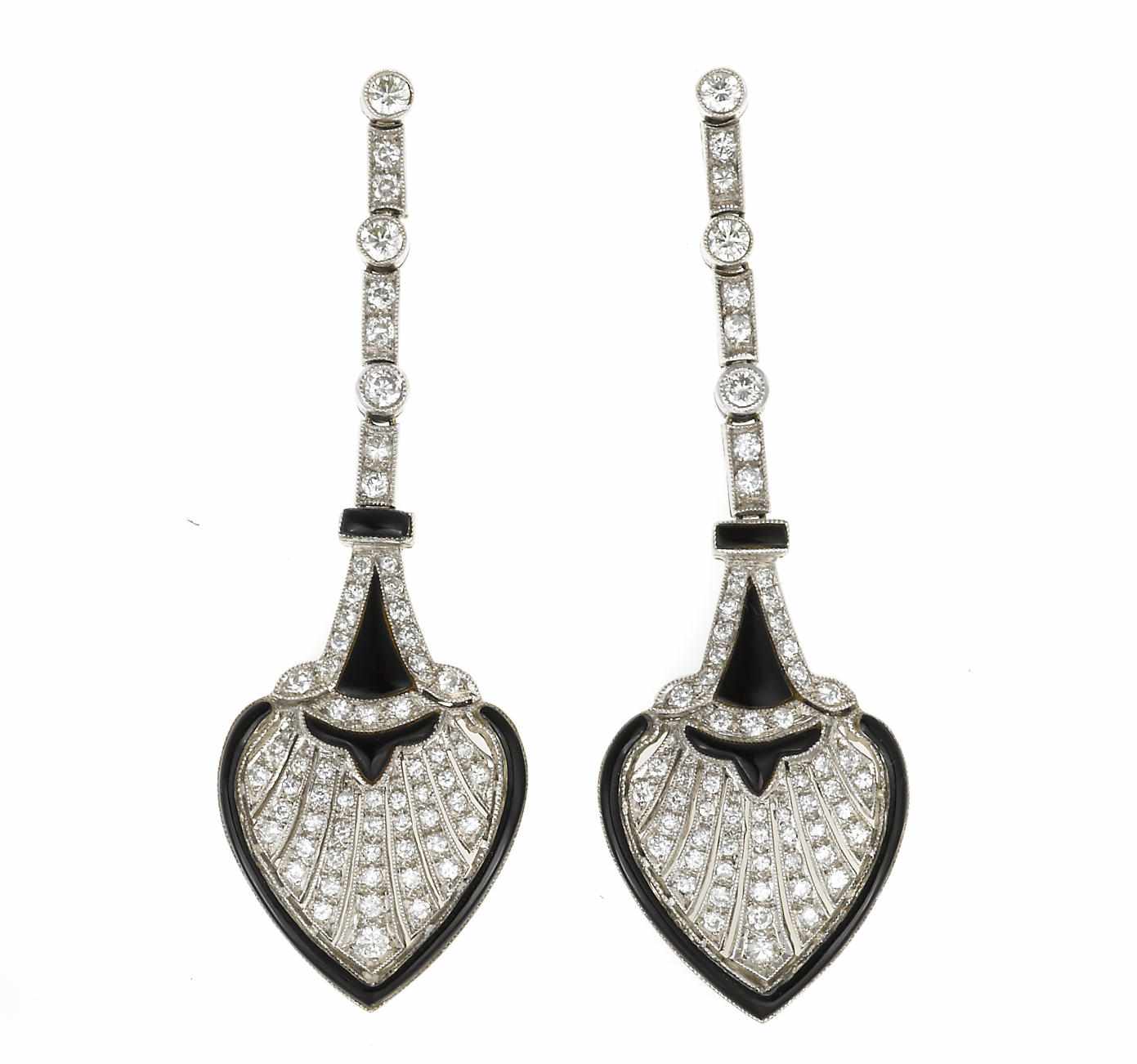 Appraisal: A pair of diamond and black onyx pendant earrings estimated