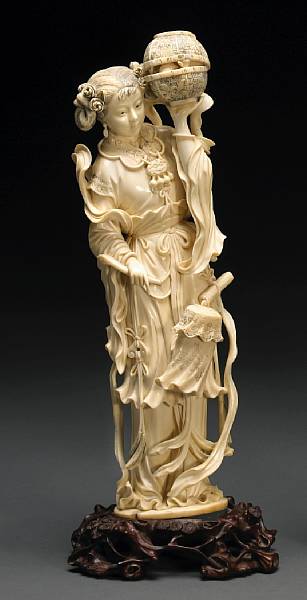 Appraisal: An ivory figural okimono th Century Depicting a statuesque Chinese