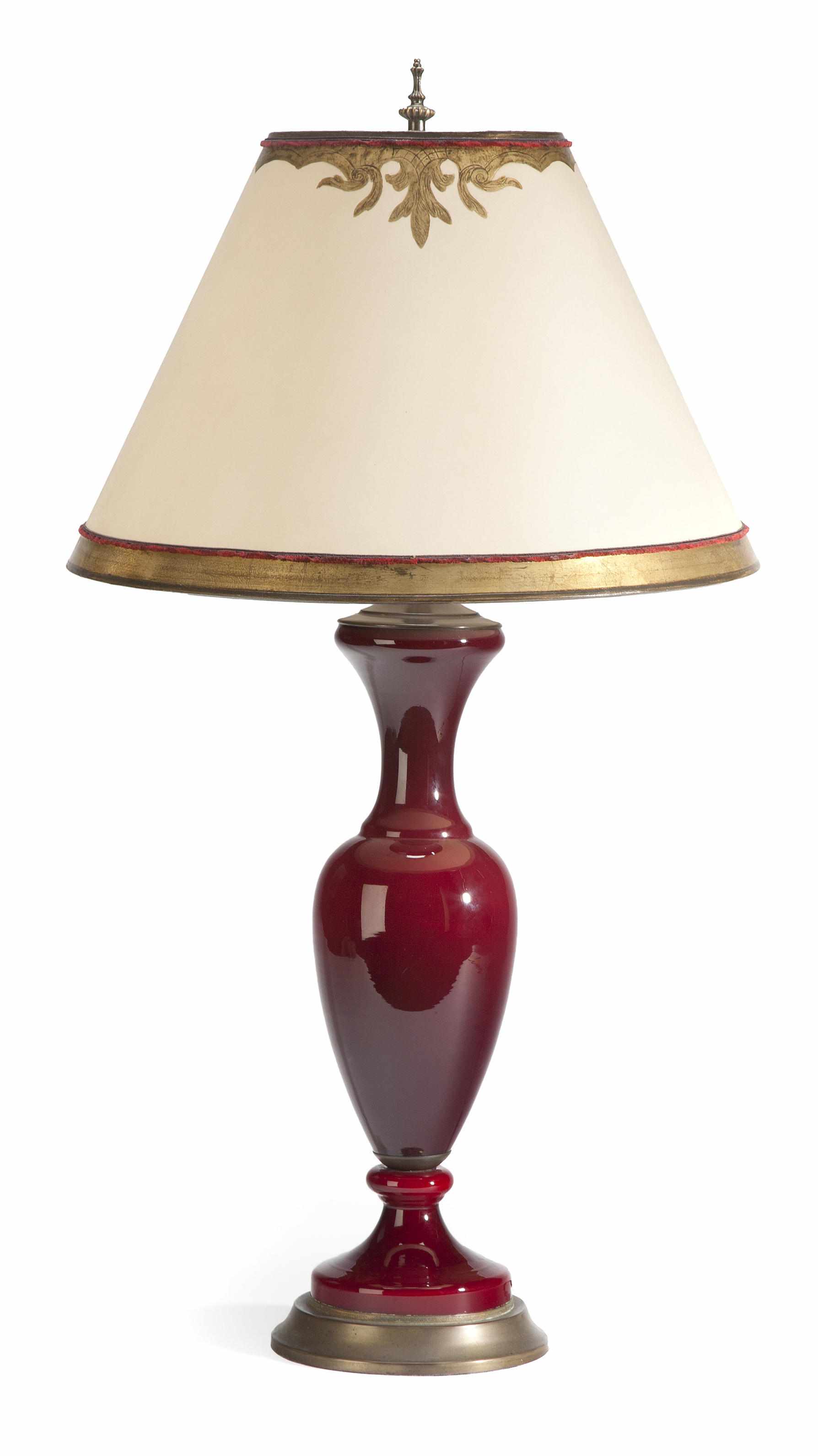 Appraisal: A Continental ruby glass table lamp of urn form height