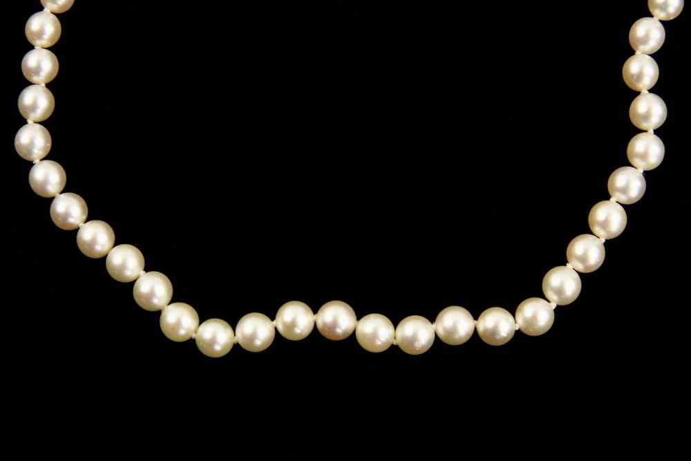 Appraisal: NECKLACE - One single strand of saltwater cultured pearls to