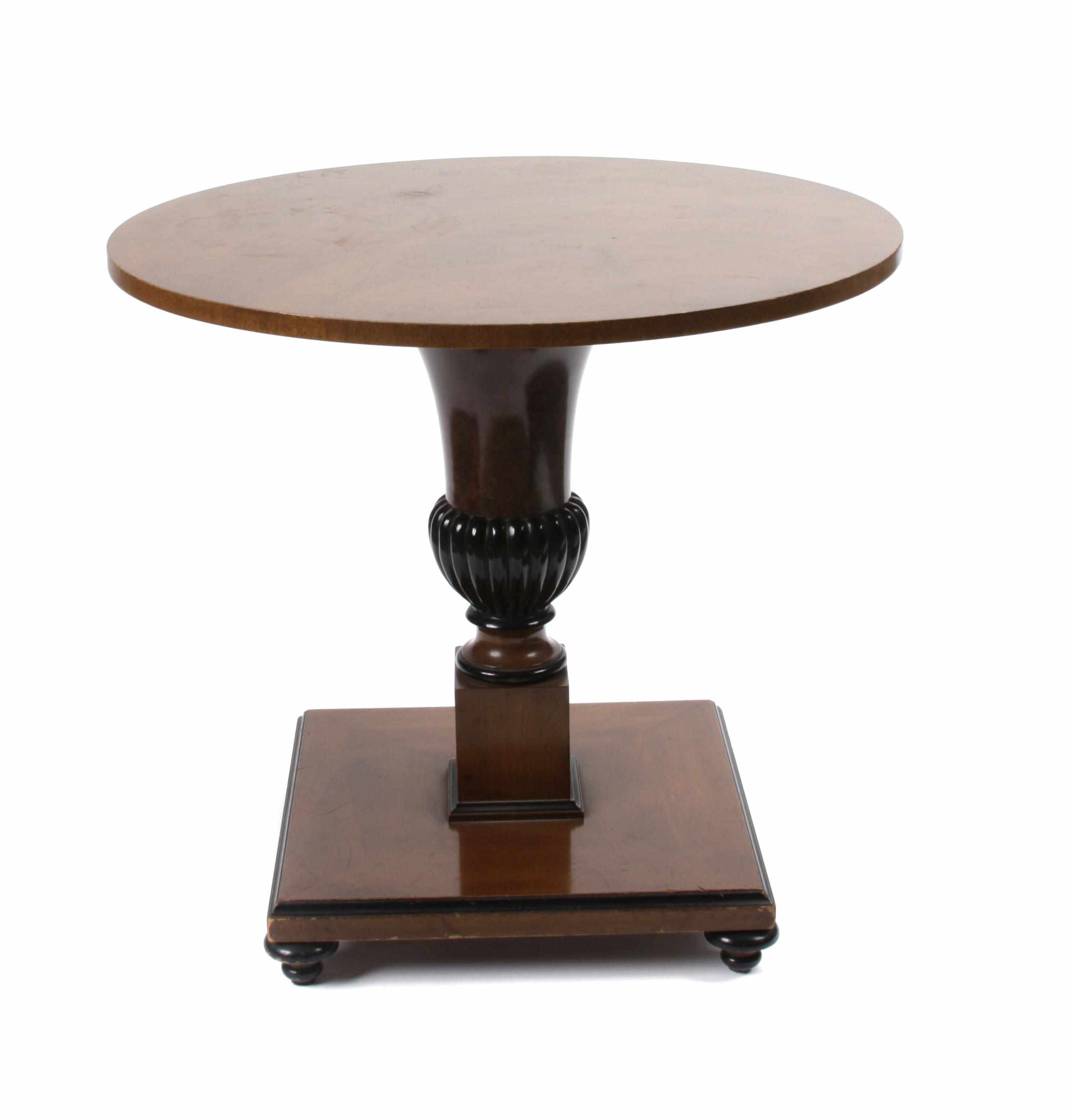 Appraisal: A Biedermeier style ebonized walnut center table height in diameter