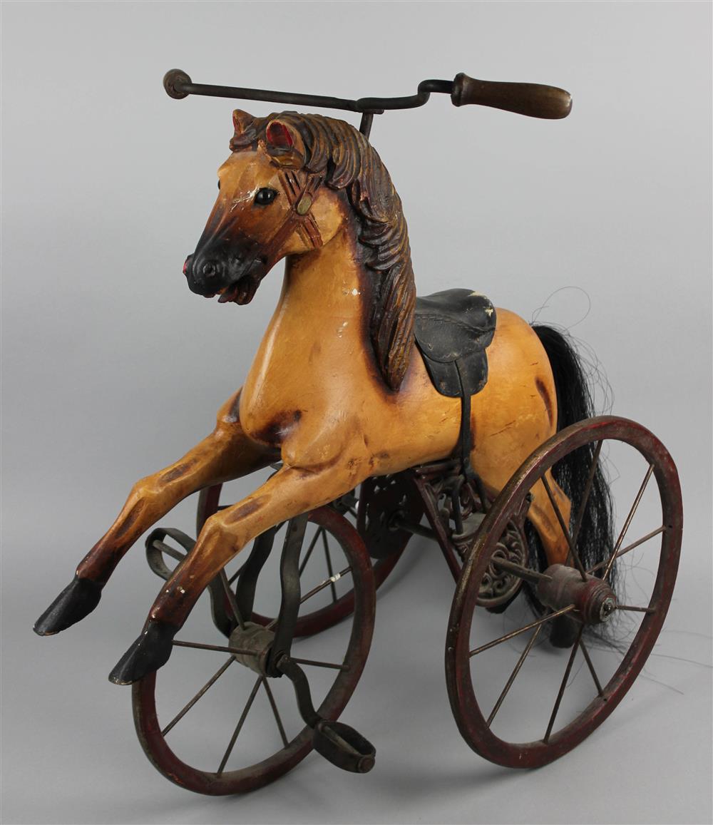 Appraisal: CHILD'S HORSE-FORM TRICYCLE naturalistically painted as a palomino and fitted