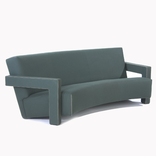 Appraisal: GERRIT RIETVELD CASSINA Curved sofa upholstered in hunter green wool