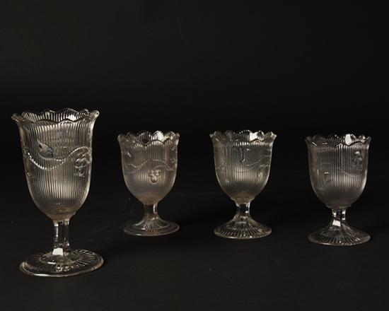 Appraisal: Four Pressed Sandwich Glass Bellflower Stems three scalloped rim goblets