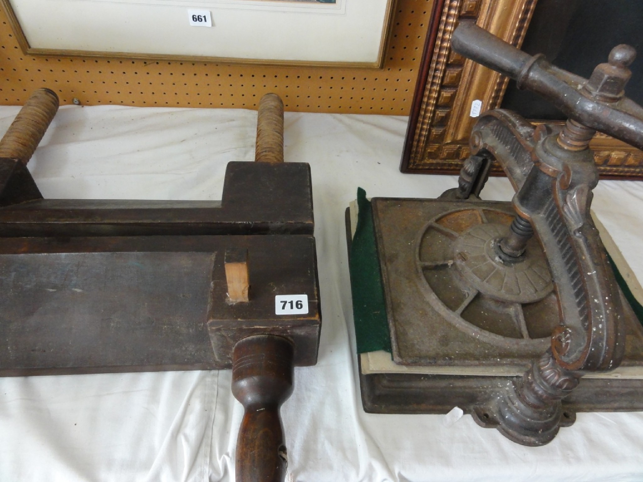 Appraisal: A Victorian cast iron book press with well moulded features