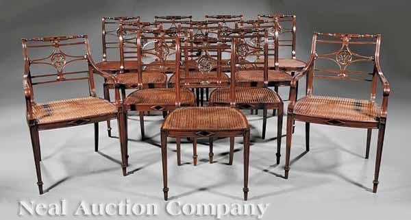 Appraisal: A Set of Twelve Carved Mahogany Dining Chairs of Regency