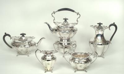 Appraisal: AN EDWARDIAN FIVE PIECE TEASET including a spirit kettle of