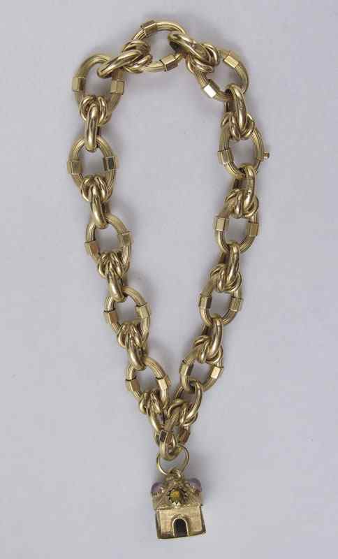 Appraisal: K CHARM BRACELET K yellow gold fancy hollow link bracelet