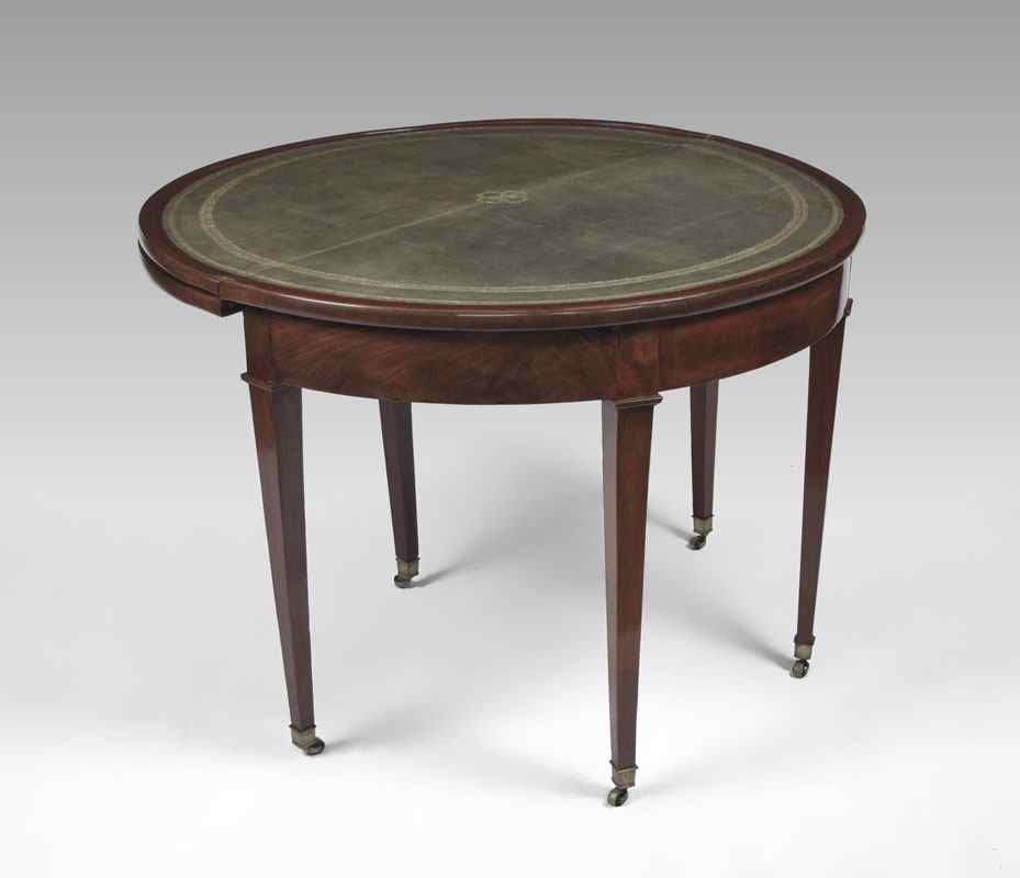 Appraisal: SHERATON STYLE DOUBLE TOP MAHOGANY GAME TABLE Double hinged top