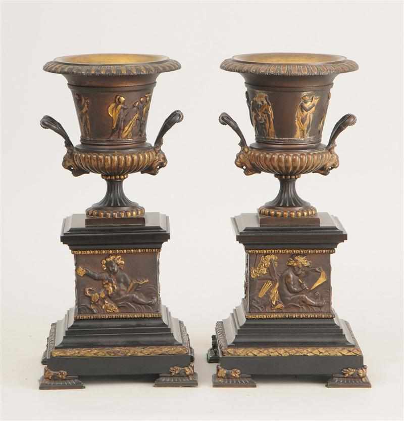 Appraisal: PAIR OF RENAISSANCE STYLE PATINATED GILT-METAL AND BLACK MARBLE URNS