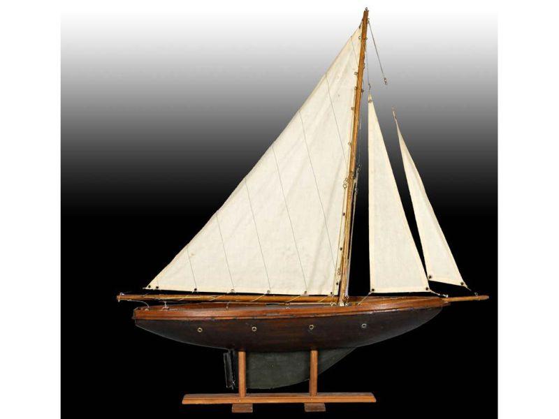 Appraisal: Wood Model American Made Sailboat with Stand Description '' L