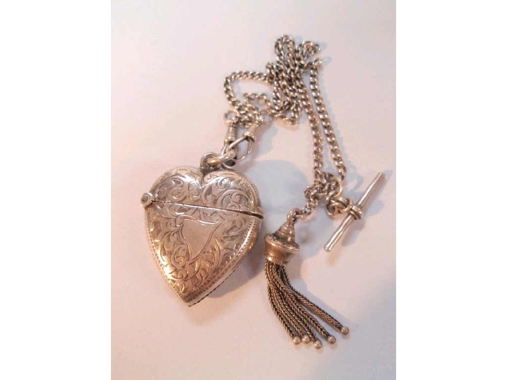 Appraisal: An Edwardian silver heart shaped vesta on chain Birmingham