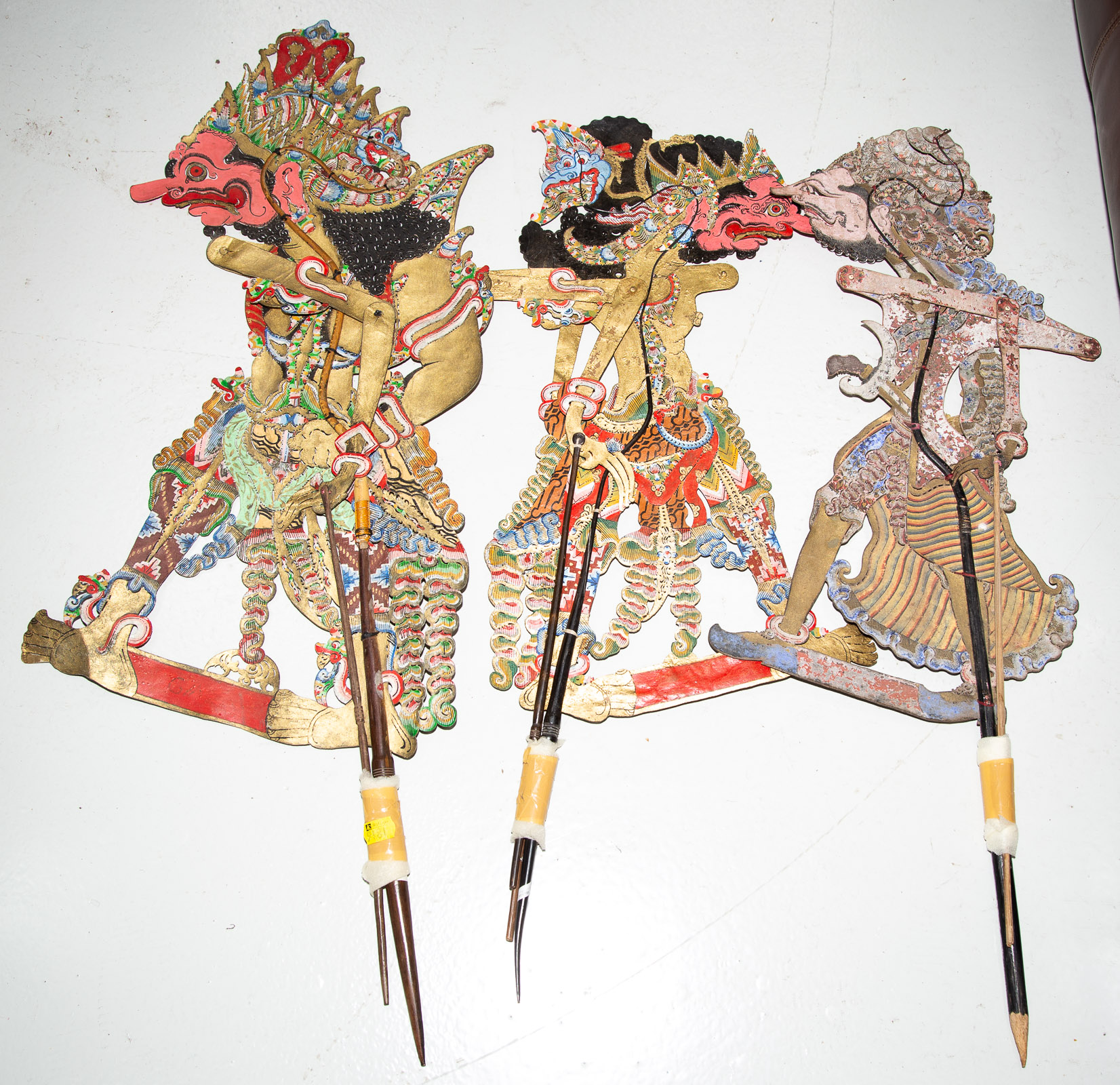 Appraisal: SELECTION OF SEVEN INDONESIAN SHADOW PUPPETS th century cut and