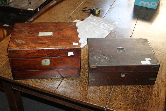 Appraisal: A VICTORIAN ROSEWOOD AND BRASS BOUND WORKBOX and another similar