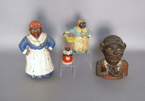 Appraisal: Jolly Black Man mechanical bank ca together with two Mammy