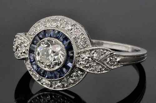 Appraisal: A s platinum mounted sapphire and diamond ring the central