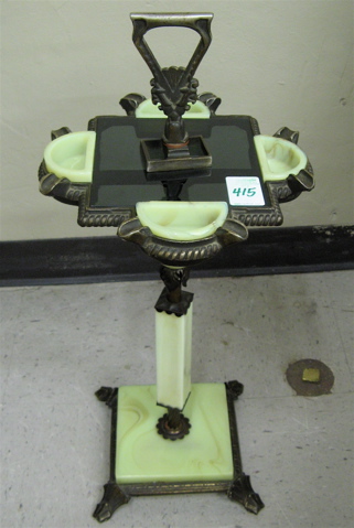 Appraisal: ART DECO SMOKING STAND American c of heavy cast iron