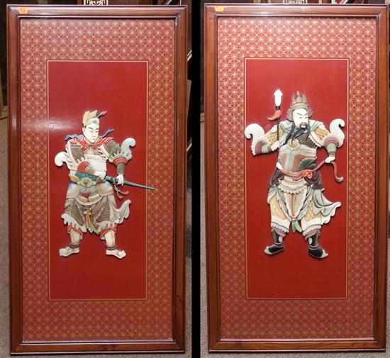 Appraisal: Pair of Japanese painted panels with relief decoration of images