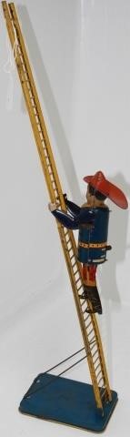 Appraisal: EARLY TH CENTURY MARX CLIMBING FIREMAN WIND-UPTIN LITHOGRAPH TOY WITH