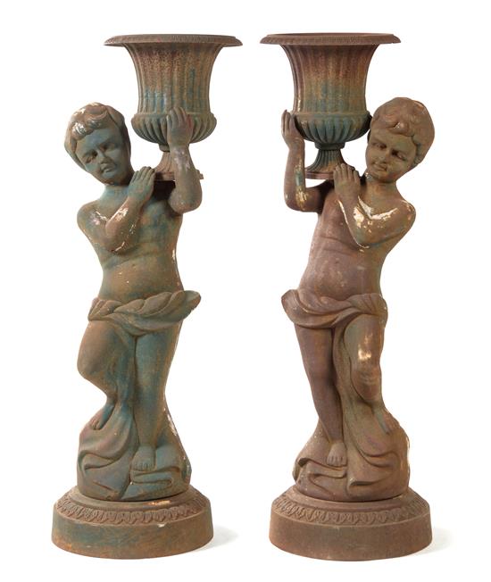 Appraisal: Sale Lot A Pair of Victorian Cast Iron Figural Jardinieres