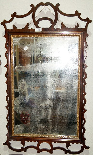 Appraisal: Chippendale style mahogany fret wall mirror th Century cm x