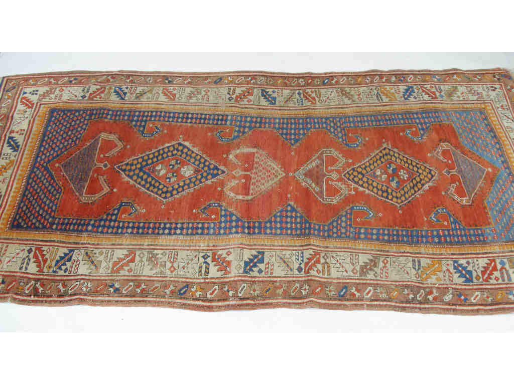 Appraisal: Shirvan Medallion Carpet Caucasus hand-tied wool base bright red central