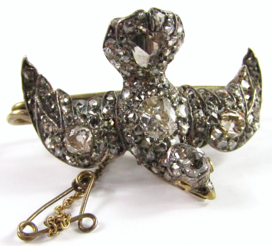 Appraisal: A ct gold diamond set bird brooch set with old