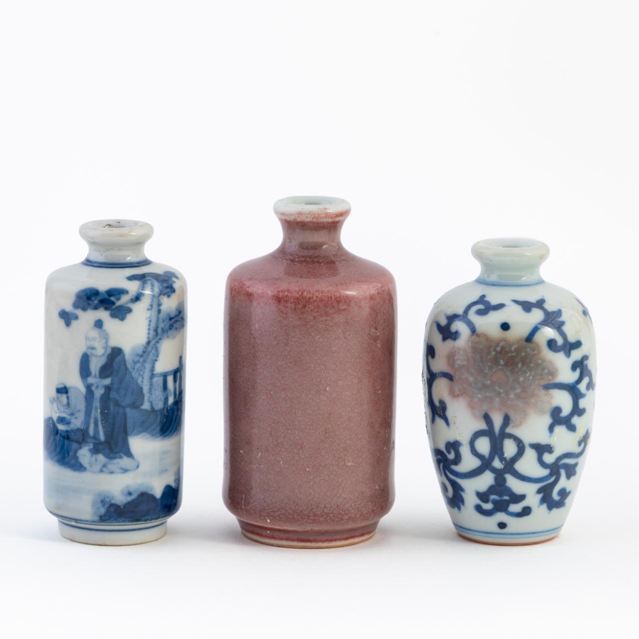 Appraisal: THREE CHINESE PORCELAIN SNUFF BOTTLES Three Chinese porcelain snuff bottles