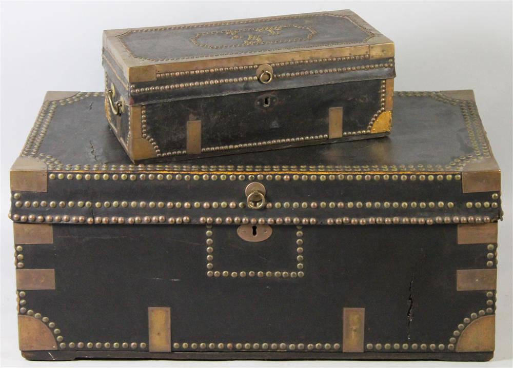 Appraisal: TWO SIMILAR LEATHER AND BRASS NAILHEAD TRIMMED TRUNKS the larger