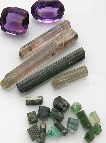 Appraisal: A collection of two unmounted amethysts together with green and