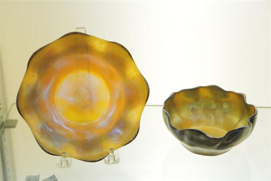 Appraisal: TIFFANY BOWL AND UNDERPLATE Gold iridescent bowl and underplate with