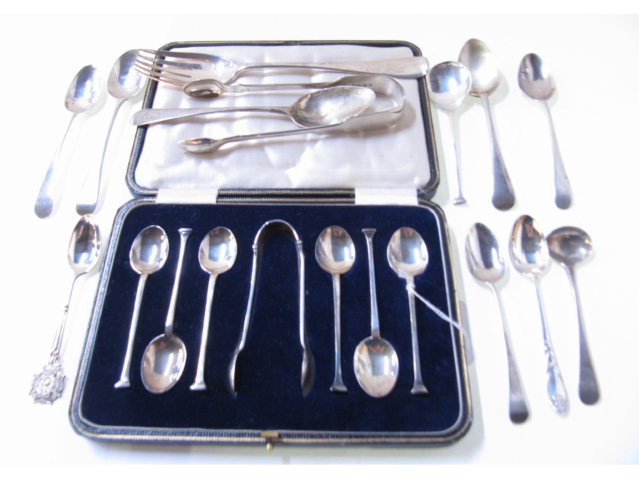 Appraisal: A lot comprising a cased set of six silver teaspoons