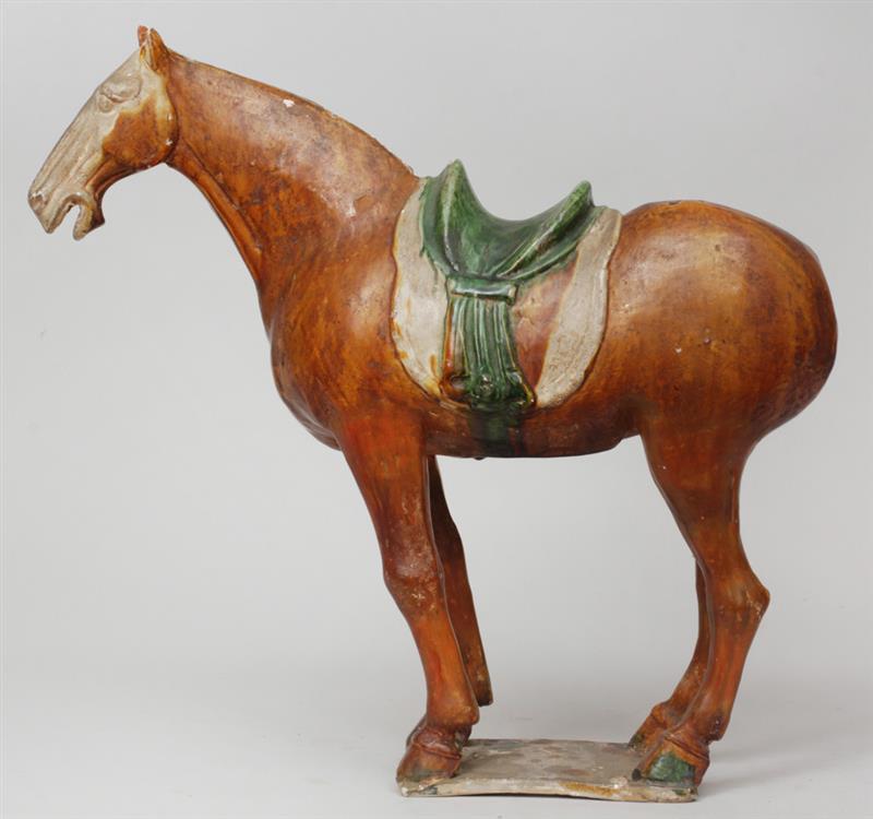 Appraisal: Tang Style Sancai-Glazed Pottery Figure of a Saddled Horse x